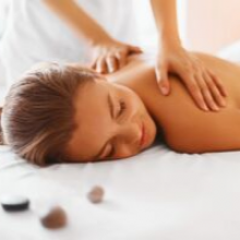 Massage therapy session focusing on upper back