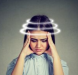 Visual depiction of vertigo with woman holding temples and circular motion effect